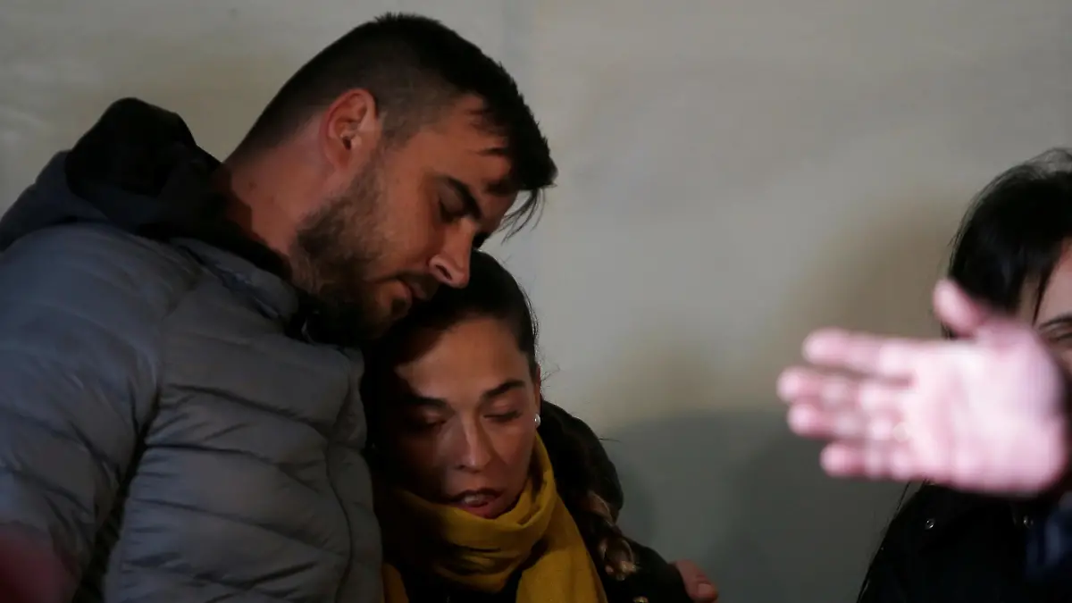 FILE PHOTO: FILE PHOTO: Julen's parents embrace each other during a vigil as a miner rescuer team descends into a drilled well at the area where Julen, a Spanish two-year-old boy, fell into a deep well eleven days ago when the family was taking a stroll through a private estate, in Totalan, southern Spain January 24, 2019. REUTERS/Jon Nazca - RC124650CC00/File Photo/File Photo