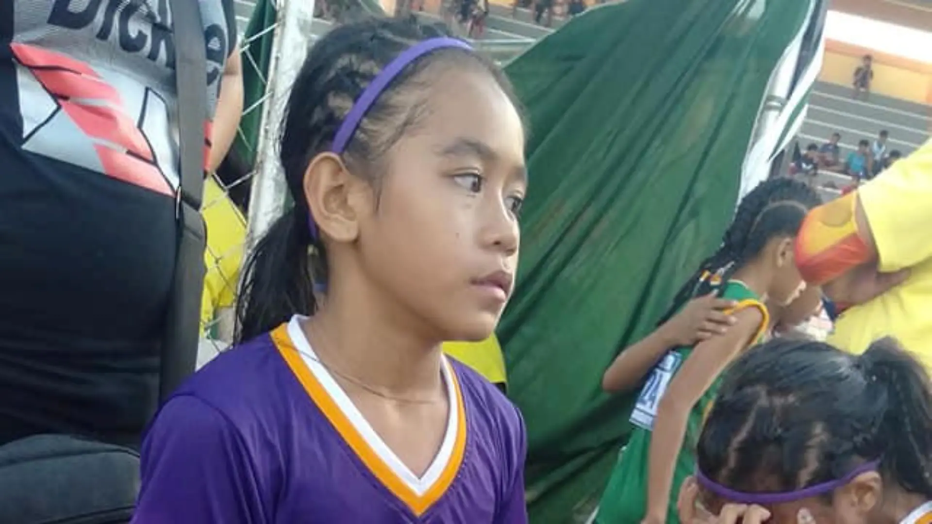 Rhea Bullos, 11, wears tape as makeshift running shoes during a 1500-meter run at the Iloilo Sports Complex, in Iloilo, Philippines December 9, 2019. Picture taken December 9, 2019. Predirick Valenzuela/Handout via REUTERS THIS IMAGE HAS BEEN SUPPLIED BY A THIRD PARTY. MANDATORY CREDIT. NO RESALES. NO ARCHIVES. REFILE - CORRECTING BYLINE SPELLING