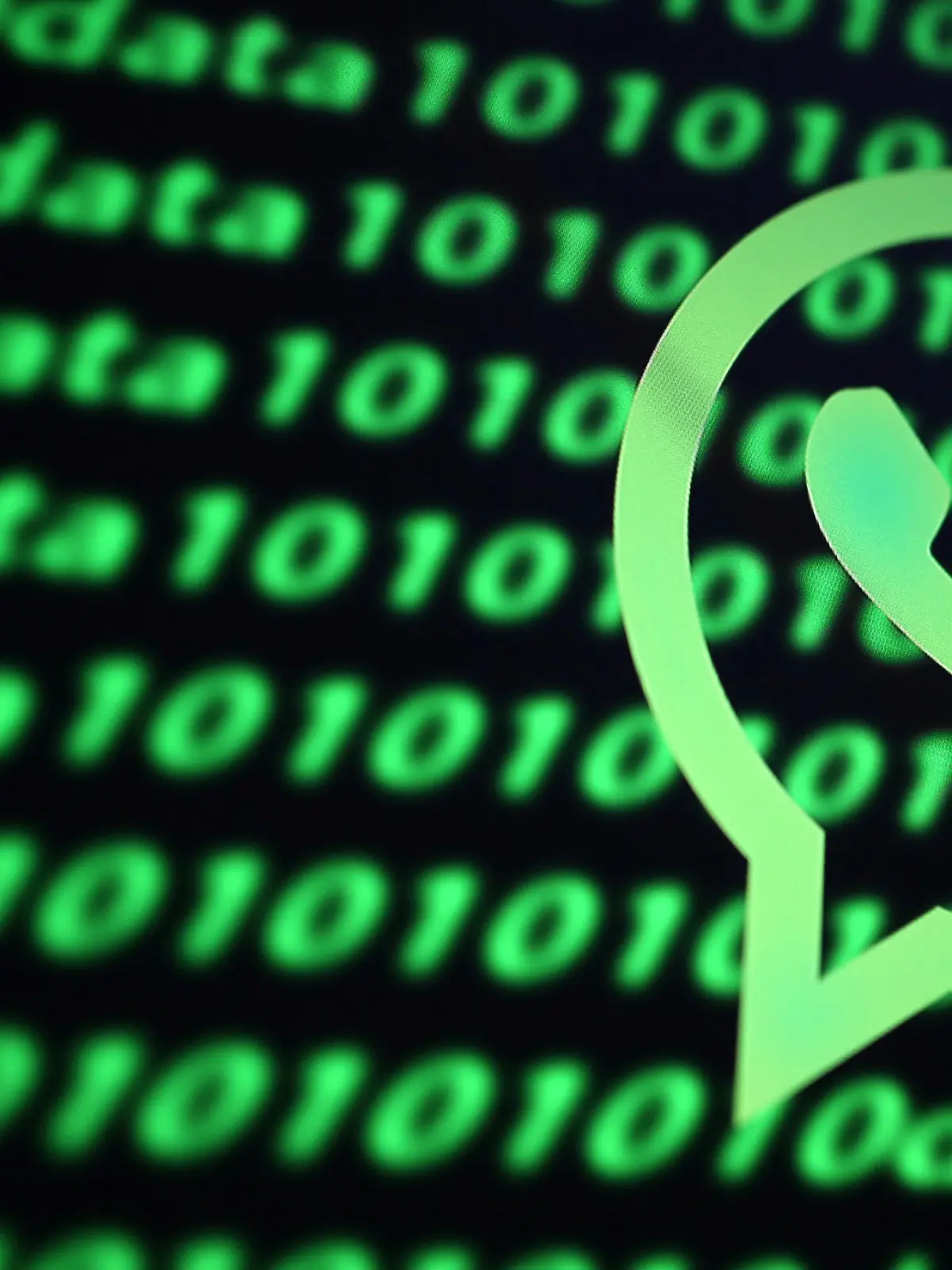 The Whatsapp logo and binary cyber codes are seen in this illustration taken November 26, 2019. REUTERS/Dado Ruvic/Illustration