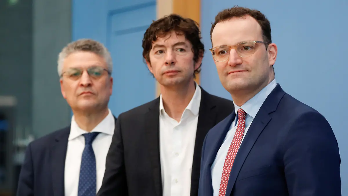 German Health Minister Jens Spahn, Director of the Institute of Virology of the Charite hospital in Berlin, Christian Drosten and Head of the Robert Koch Institute, Lothar Wieler arrive for a news conference to update on coronavirus spread, in Berlin, Germany, March 9, 2020. REUTERS/Fabrizio Bensch