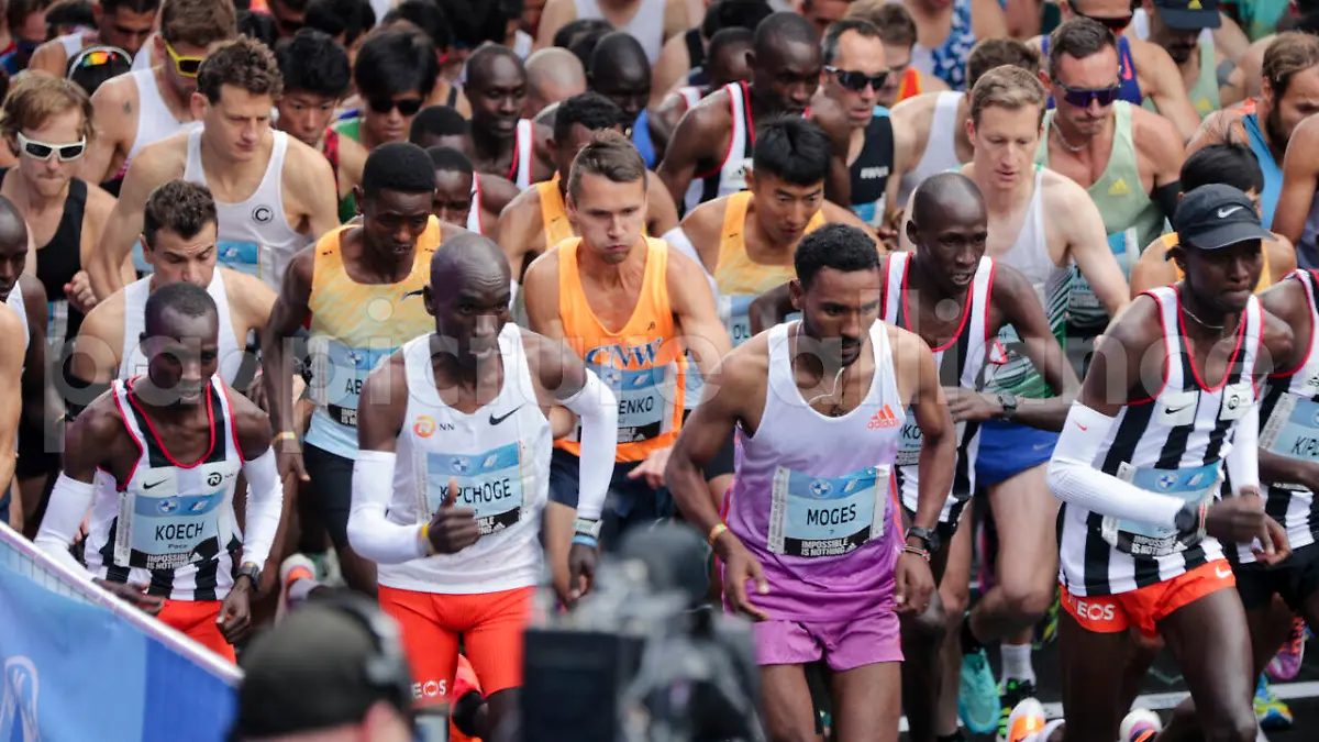 Eliud Kipchoge, second from left, runs at the start of the Berlin Marathon in Berlin, Germany, Sunday, Sept. 25, 2022. (AP Photo/Christoph Soeder)