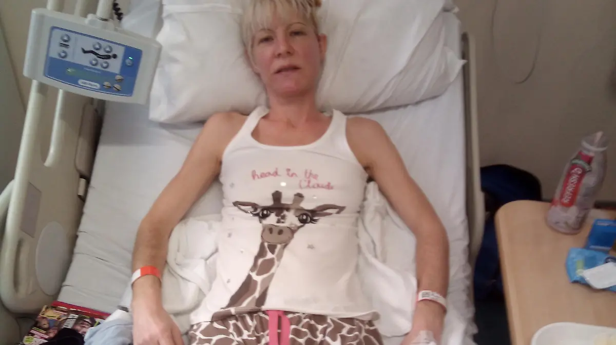 Story from Jam Press (EDS Condition)

Pictured: Kate Mallinson in hospital after her jaw surgery, 2017.

'I'm being tortured in my own body': Doncaster mum shares "unbearable" life with illness so bad she can't play with son or go to the toilet without husband's help

A mum has shared her "debilitating" ordeal after being diagnosed with a rare condition and fears she's missing out on her son's life – with the young  boy feeling "guilty" that he can't "help" his mum.

Kate Mallinson, 45, from Doncaster, has battled "unbearable" symptoms for the past 14 years, where she struggles to hold up her own head due to "excruciating" pain. 

In June 2022, she was diagnosed with Ehlers-Danlos Syndrome (EDS) a genetic condition that affects the connective tissue and muscles, and she also has scoliosis and Crohn's disease.

She's had to quit her job due to the "horrific" pain and is unable to spend quality time with her son, Samuel, 10, as she's too exhausted. 

"I can very rarely run around with him or play any outdoor games and on the occasions I have, I have to stop and vomit," Kate told NeedToKnow.Online. 

"On 'proper' bad days, I can't get up to get my son ready for school or take him there and my mum has to come round and do everything for me. 

"My husband, Roy, has to pick our son up every day because I can't manage it by that time in the day – I'm truly exhausted. 

"Every day is different and I try hard to make a 'good' day for my son when I can and do as many 'mummy' things as possible." 

The situation has also affected Kate's son.

Kate's son said: "I feel guilty that I cannot help mummy. 

"I try to do things like tidy up and help make tea and look after myself a bit, but it's so sad seeing her in pain all the time. 

"Also, not knowing what to do when she is crying. 

"All my life, I've seen mummy in pain and it would really make happy to see her smiling, not crying."

Before falling ill, Kate was working toward achieving her doctorate, as well as being an ou
