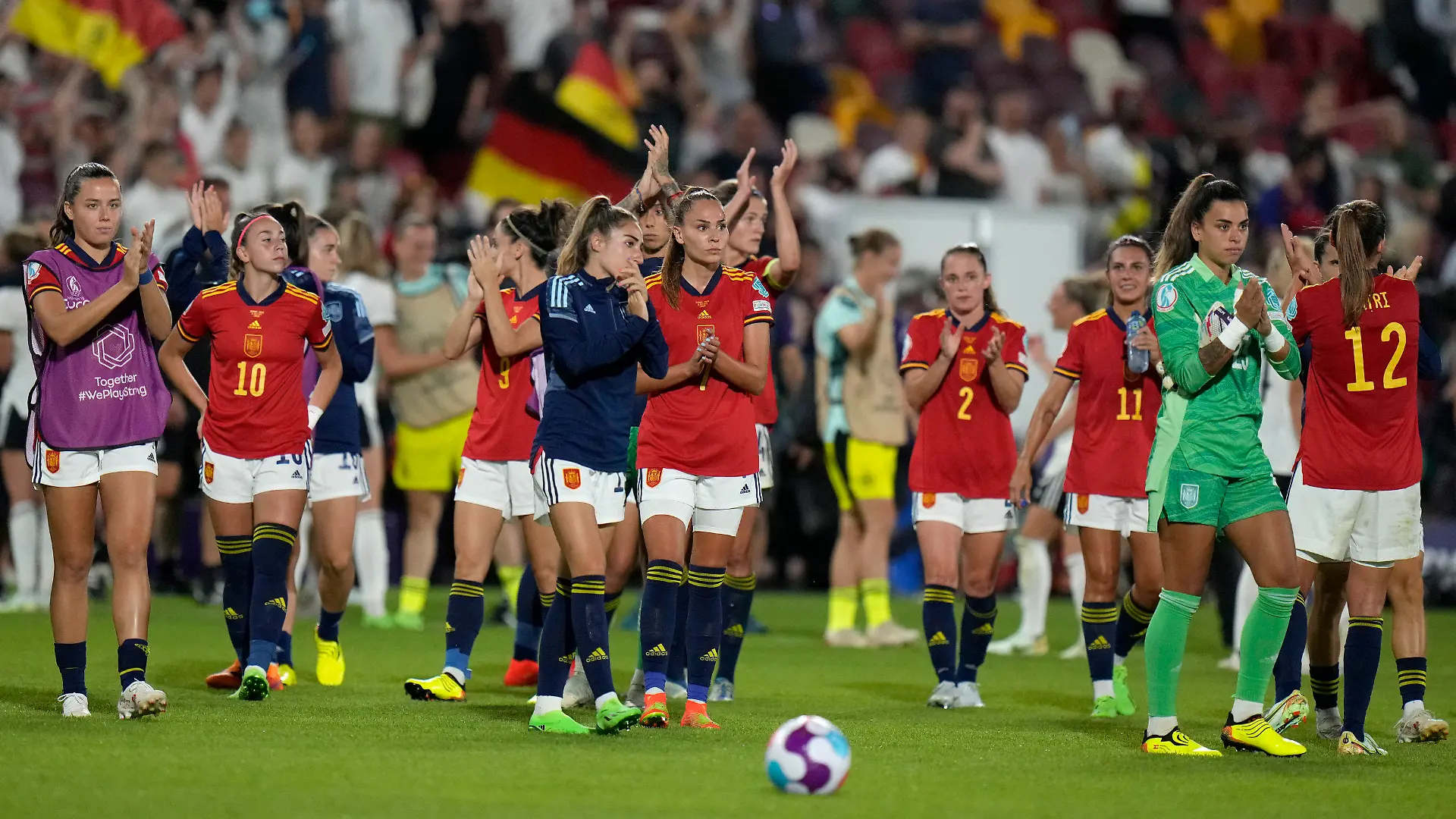 FILE - Spain players applaud the fans at the end of a Women Euro 2022 group B soccer match against German on July 12, 2022, in London. Germany won 2-0. Fifteen players are expected to quit Spain's national team after their demand for a coaching change was rejected by the Spanish federation on Thursday, Sept. 22. The federation said it received identical emails from the 15 players saying they would renounce their places on the team if coach Jorge Vilda wasn’t fired. (AP Photo/Alessandra Tarantino, File)