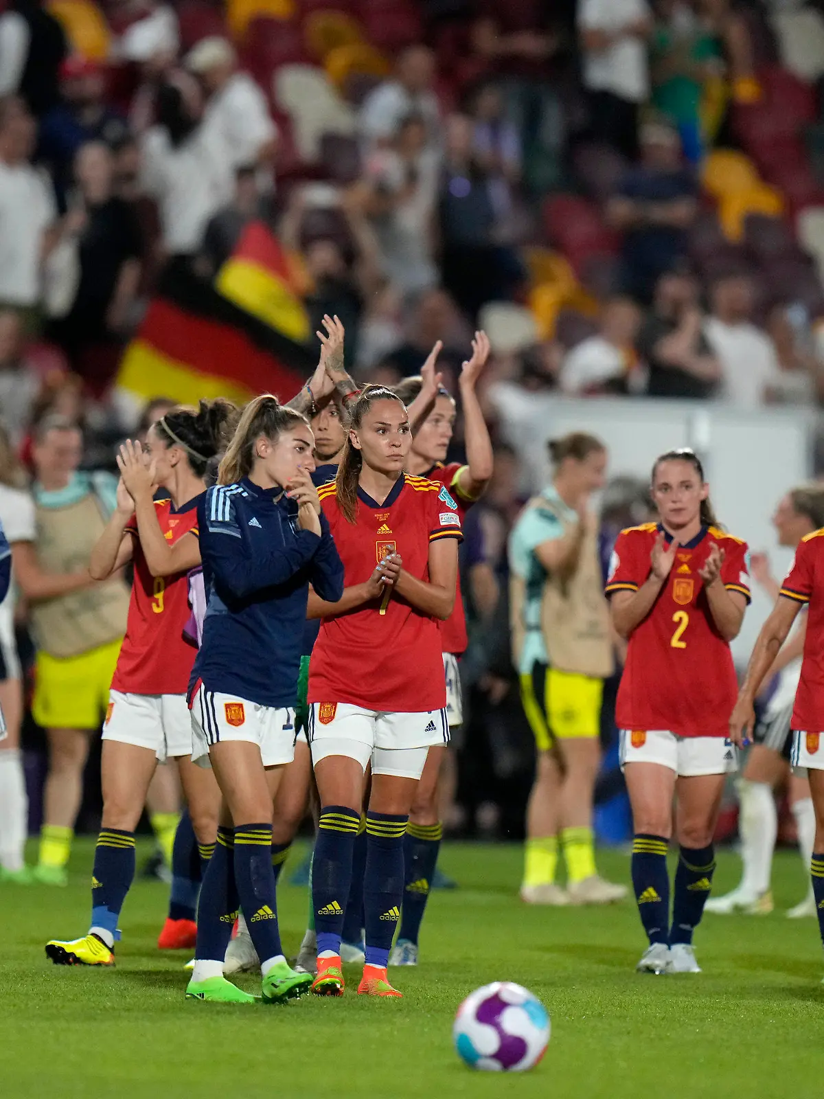 FILE - Spain players applaud the fans at the end of a Women Euro 2022 group B soccer match against German on July 12, 2022, in London. Germany won 2-0. Fifteen players are expected to quit Spain's national team after their demand for a coaching change was rejected by the Spanish federation on Thursday, Sept. 22. The federation said it received identical emails from the 15 players saying they would renounce their places on the team if coach Jorge Vilda wasn’t fired. (AP Photo/Alessandra Tarantino, File)