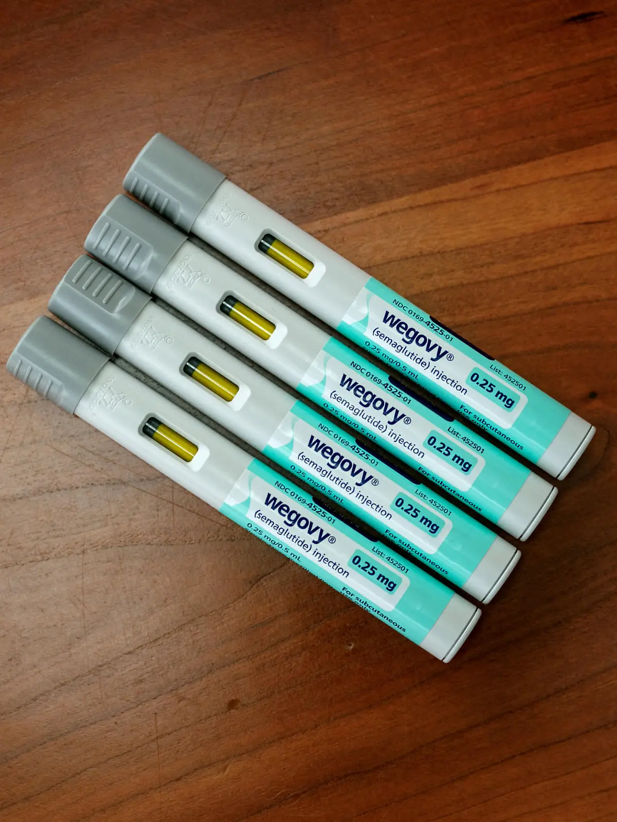 FILE PHOTO: A selection of injector pens for the Wegovy weight loss drug are shown in this photo illustration in Chicago, Illinois, U.S., March 31, 2023.  REUTERS/Jim Vondruska/Illustration/File Photo