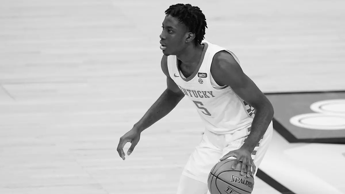 FILE - In this Dec. 1, 2020, file photo, Kentucky's Terrence Clarke brings the ball up during the second half of the team's NCAA college basketball game against Kansas in Indianapolis. Kentucky says freshman guard Clarke died following a car accident in Los Angeles. He was 19. The school announced Clarke’s death in a release Thursday night, April 22, 20221, but did not include any more details. (AP Photo/Darron Cummings, File)