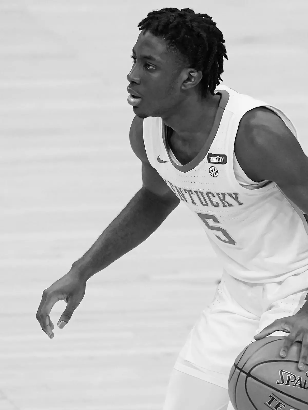 FILE - In this Dec. 1, 2020, file photo, Kentucky's Terrence Clarke brings the ball up during the second half of the team's NCAA college basketball game against Kansas in Indianapolis. Kentucky says freshman guard Clarke died following a car accident in Los Angeles. He was 19. The school announced Clarke’s death in a release Thursday night, April 22, 20221, but did not include any more details. (AP Photo/Darron Cummings, File)