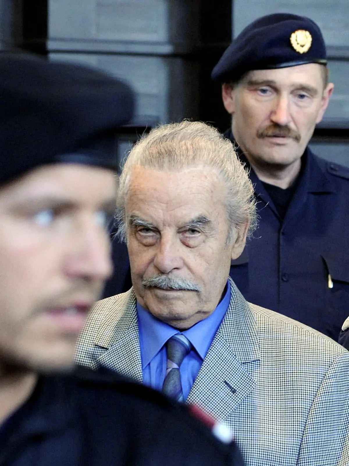 FILE PHOTO: Defendant Josef Fritzl is pictured during proceedings on the last day the last day of his trial at the court of law in Sankt Poelten in Austria's province of Lower Austria March 19, 2009.   REUTERS/POOL/Robert Jaeger  FOR EDITORIAL USE ONLY. NOT FOR SALE FOR MARKETING OR ADVERTISING CAMPAIGNS/File Photo