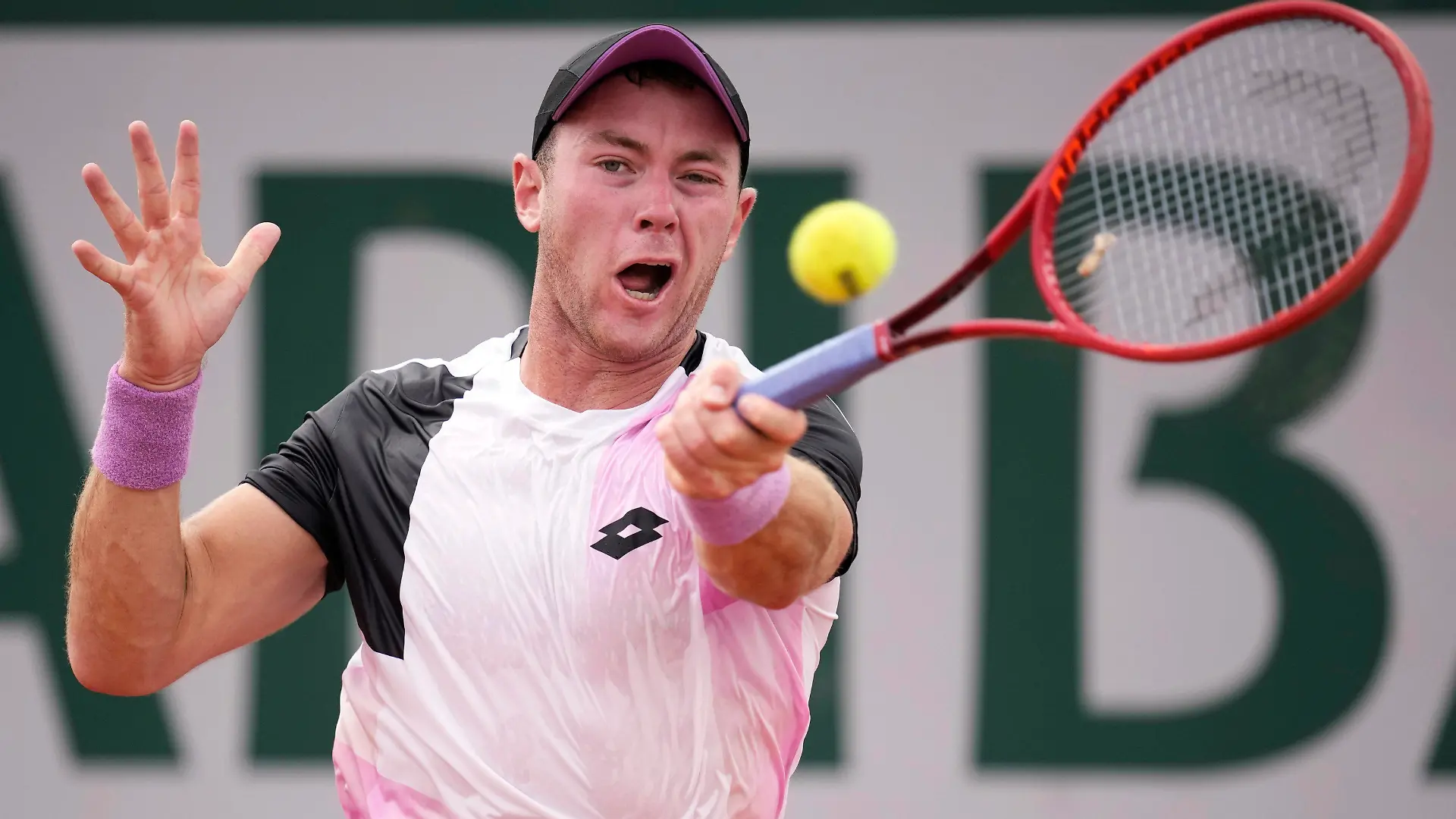 Germany's Dominik Koepfer plays a return to United States's Taylor Fritz during their second round match on 5, of the French Open tennis tournament at Roland Garros in Paris, France, Thursday, June 3, 2021. (AP Photo/Christophe Ena)
