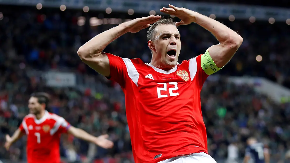 FILE PHOTO: Soccer Football - Euro 2020 Qualifier - Group I - Russia v Scotland - Luzhniki Stadium, Moscow, Russia - October 10, 2019  Russia's Artem Dzyuba celebrates scoring their third goal          REUTERS/Evgenia Novozhenina/File Photo