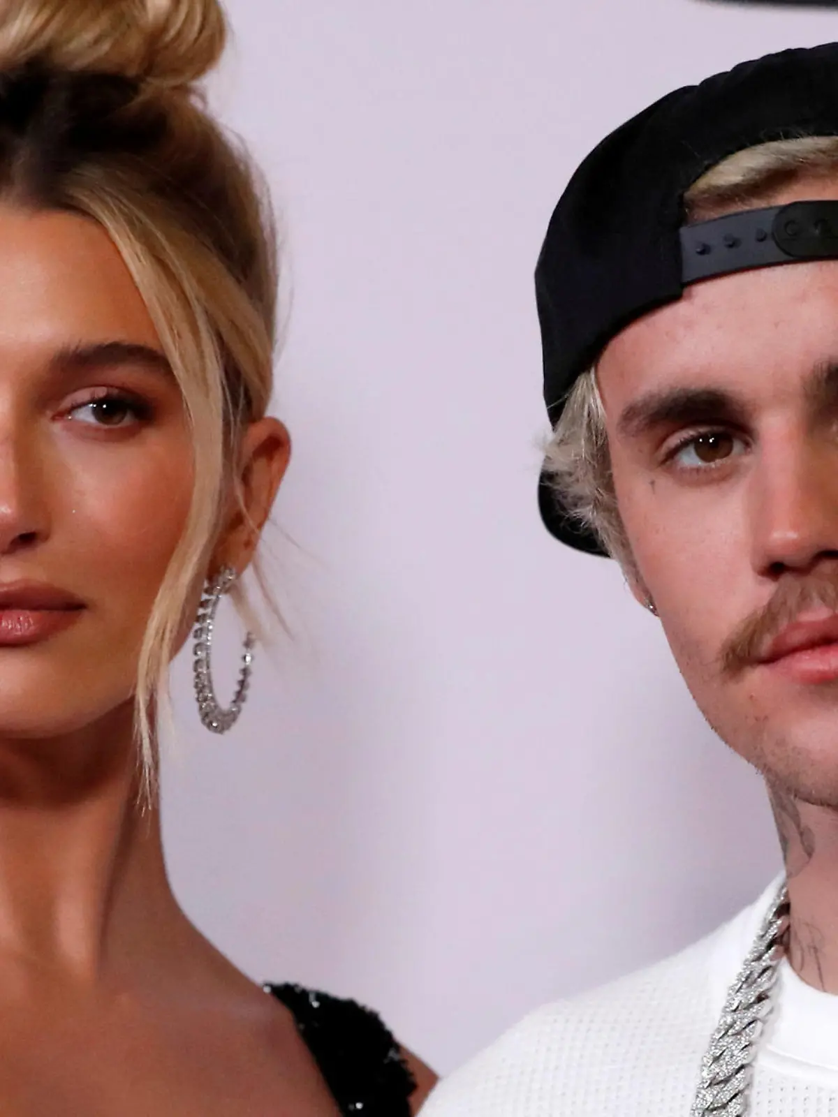 FILE PHOTO: Singer Justin Bieber and his wife Hailey Baldwin pose at the premiere for the documentary television series "Justin Bieber: Seasons" in Los Angeles, California, U.S., January 27, 2020. REUTERS/Mario Anzuoni/File Photo