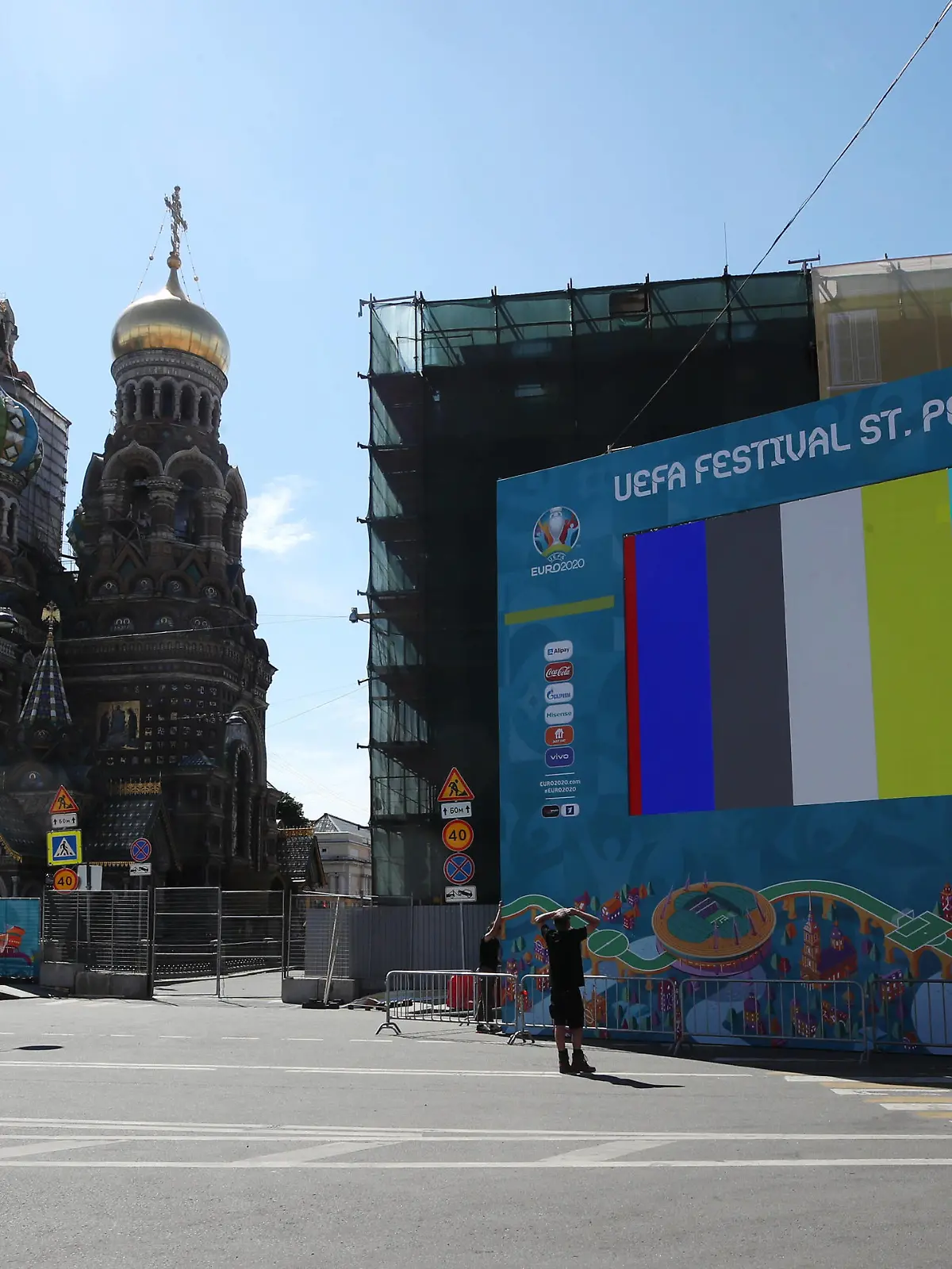  ST PETERSBURG, RUSSIA  JUNE 9, 2021: A screen at a football village in Konyushennaya Square ahead of the UEFA EURO, EM, Europameisterschaft,Fussball 2020 Championship. Entry to the fan zone is free and does not require a Fan-ID or a negative PCR test for coronavirus no more than 5 thousand people will be allowed in. Pictured in the back is the Church of the Savior on Spilled Blood. Alexander Demianchuk/TASS PUBLICATIONxINxGERxAUTxONLY TS104209