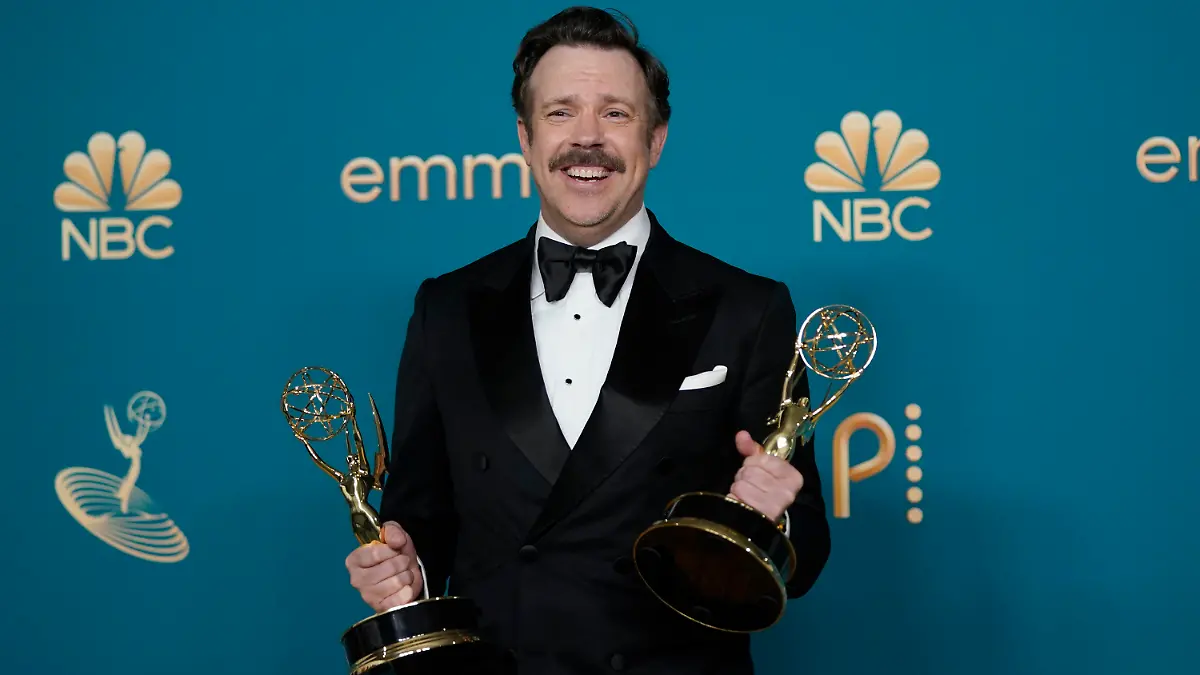 Jason Sudeikis, winner of the Emmys for outstanding lead actor in a comedy series and outstanding comedy series for "Ted Lasso" poses in the press room at the 74th Primetime Emmy Awards on Monday, Sept. 12, 2022, at the Microsoft Theater in Los Angeles. (AP Photo/Jae C. Hong)