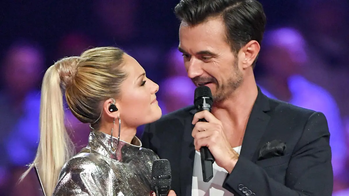 13.01.2019, Berlin: Schlagerchampions - Das große Fest der Besten, Live-Show im Ersten mit Gastgeber Florian Silbereisen. Florian Silbereisen steht mit seiner früheren Lebensgefährtin, der Sängerin Helene Fischer, auf der Bühne. Foto: Jens Kalaene/dpa-Zentralbild/ZB