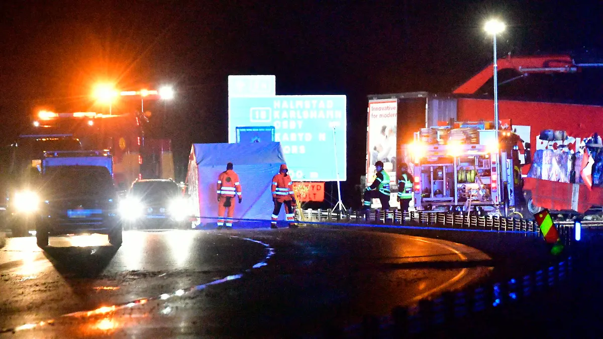 People work on the scene after an accident on Sunday, Oct. 3, 2021 outside the town Markaryd in Sweden. Three people died in the accident one of them is the Swedish artist Lars Vilks and the other two were police officers. Lars Vilks has had a permanent police protection and body guards after several attempts have been made to attack him. He has been under constant threat after portraying the Prophet Muhammad as a dog. (Johan Nilsson/TT via AP)