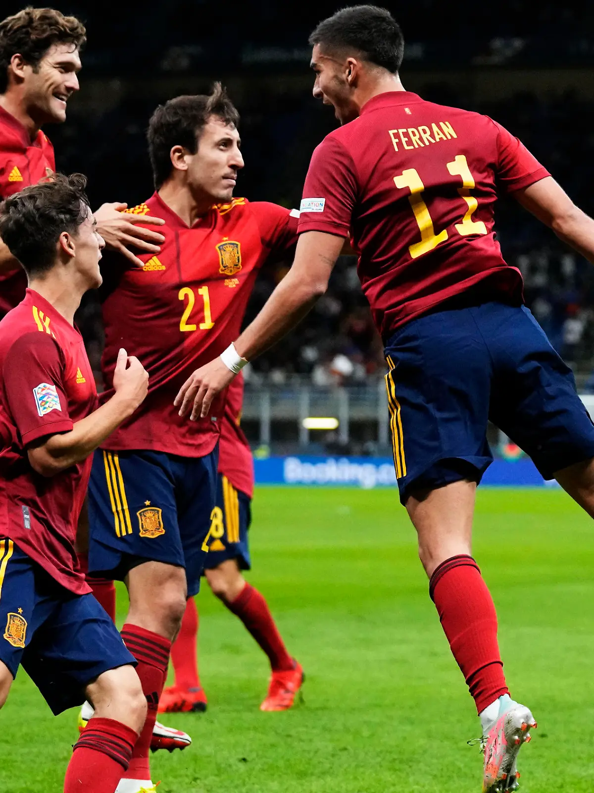 Spain's Ferran Torres, right, celebrates with teammates after scoring during the UEFA Nations League semifinal soccer match between Italy and Spain at the San Siro stadium, in Milan, Italy, Wednesday, Oct. 6, 2021. (AP Photo/Antonio Calanni)