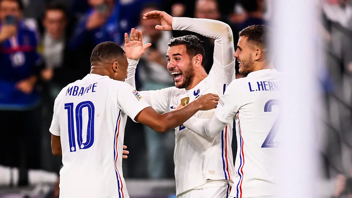 France’s Theo Hernandez, center, celebrates after scoring his side’s third goal during the UEFA Nations League semifinal soccer match between Belgium and France at the Juventus stadium, in Turin, Italy, Thursday, Oct. 7, 2021. (Fabio Ferrari/LaPresse via AP)