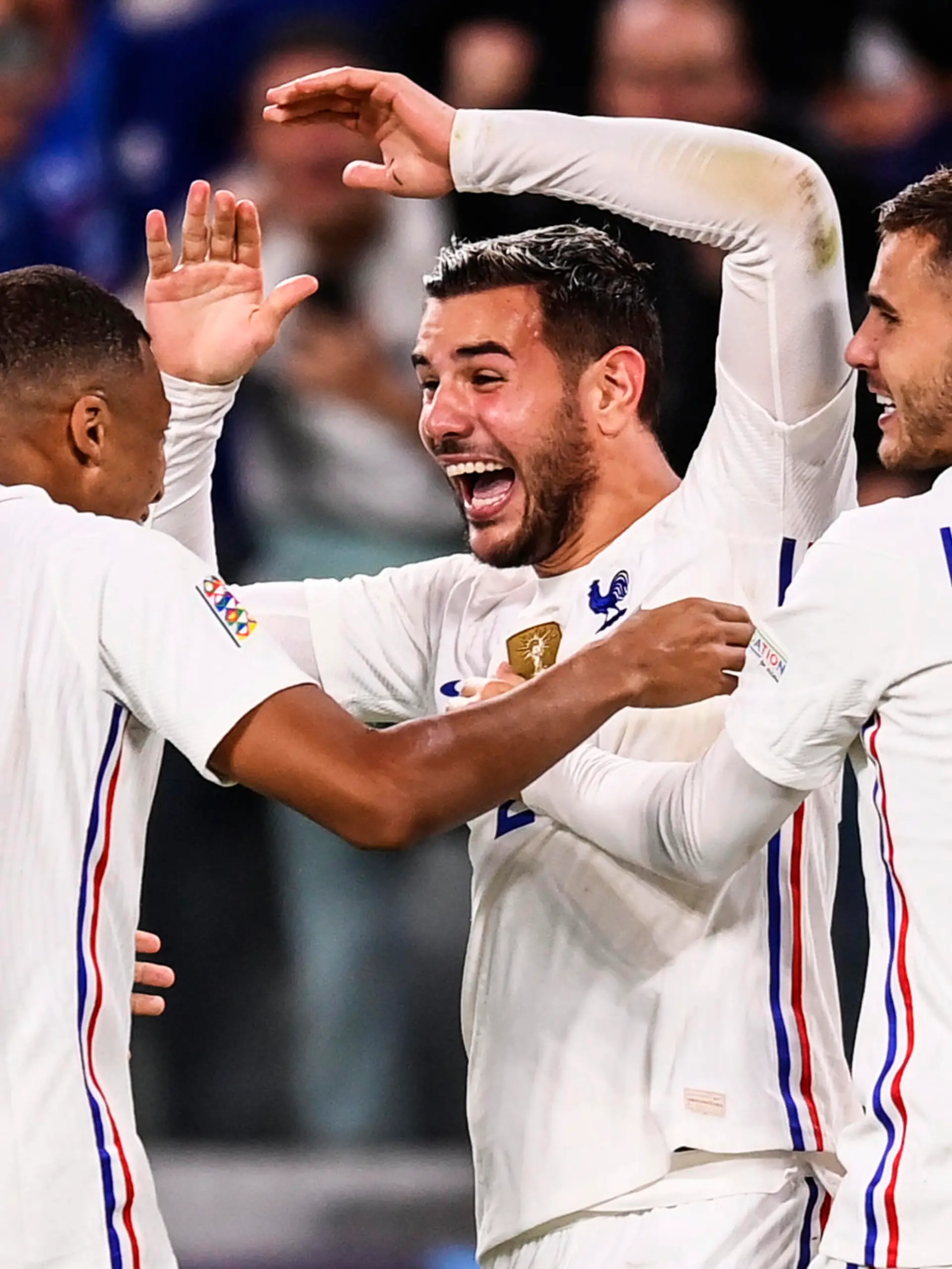 France’s Theo Hernandez, center, celebrates after scoring his side’s third goal during the UEFA Nations League semifinal soccer match between Belgium and France at the Juventus stadium, in Turin, Italy, Thursday, Oct. 7, 2021. (Fabio Ferrari/LaPresse via AP)