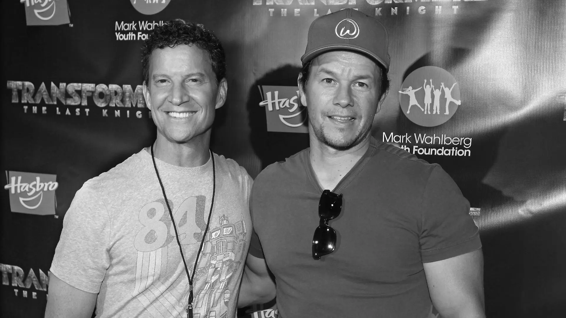 TRANSFORMERS: THE LAST KNIGHT star, Mark Wahlberg, right, and Brian Goldner, Hasbro Chairman & CEO and Executive Producer of TRANSFORMERS: THE LAST KNIGHT, walk the red carpet at the TRANSFORMERS: THE LAST KNIGHT Charity Premiere with the Mark Wahlberg Youth Foundation at Showcase LIVE, Patriot Place in Foxborough, Mass., Monday, June 19, 2017. (Photo by Stew Milne/Invision for Hasbro/AP Images)