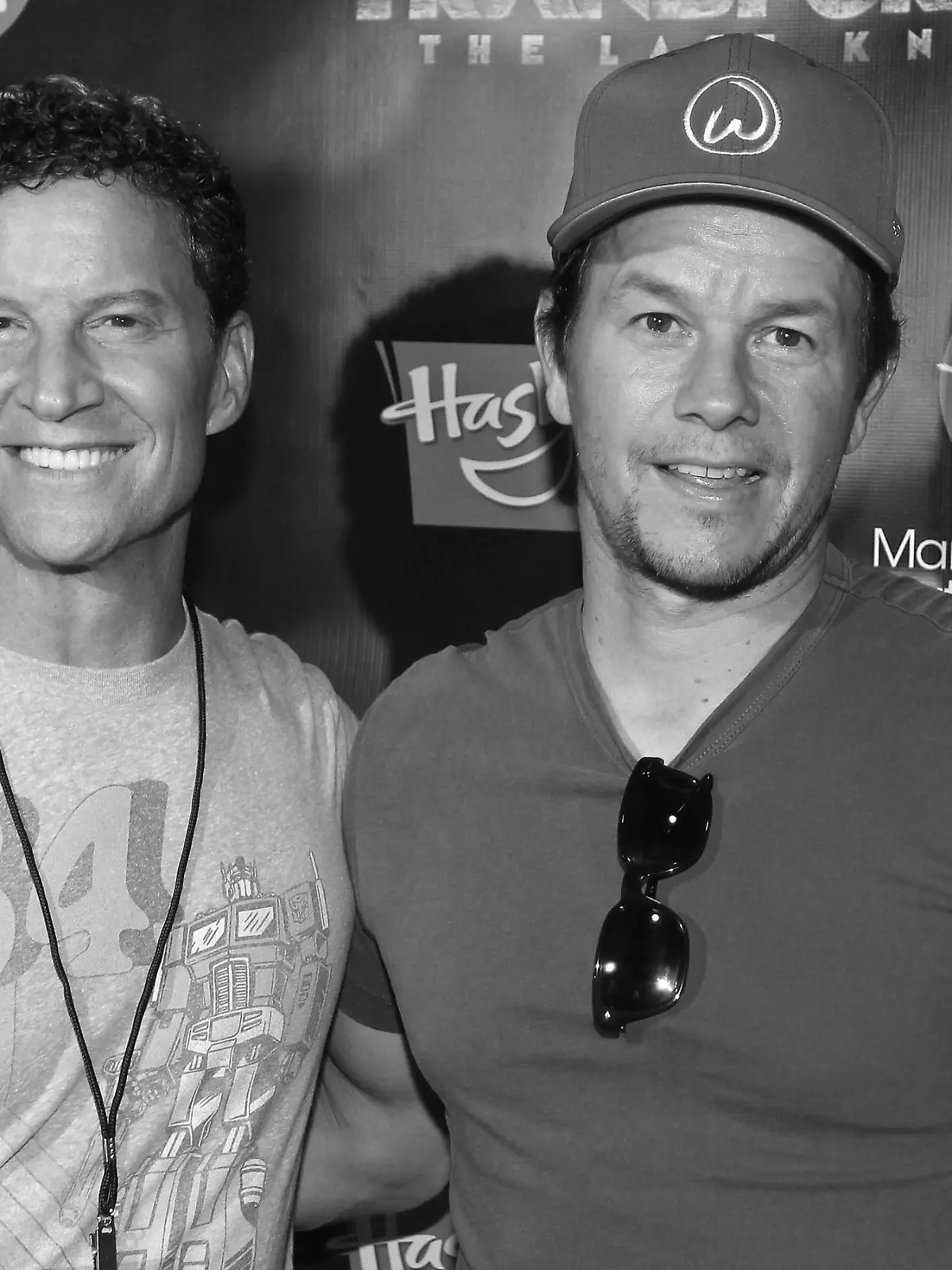 TRANSFORMERS: THE LAST KNIGHT star, Mark Wahlberg, right, and Brian Goldner, Hasbro Chairman & CEO and Executive Producer of TRANSFORMERS: THE LAST KNIGHT, walk the red carpet at the TRANSFORMERS: THE LAST KNIGHT Charity Premiere with the Mark Wahlberg Youth Foundation at Showcase LIVE, Patriot Place in Foxborough, Mass., Monday, June 19, 2017. (Photo by Stew Milne/Invision for Hasbro/AP Images)
