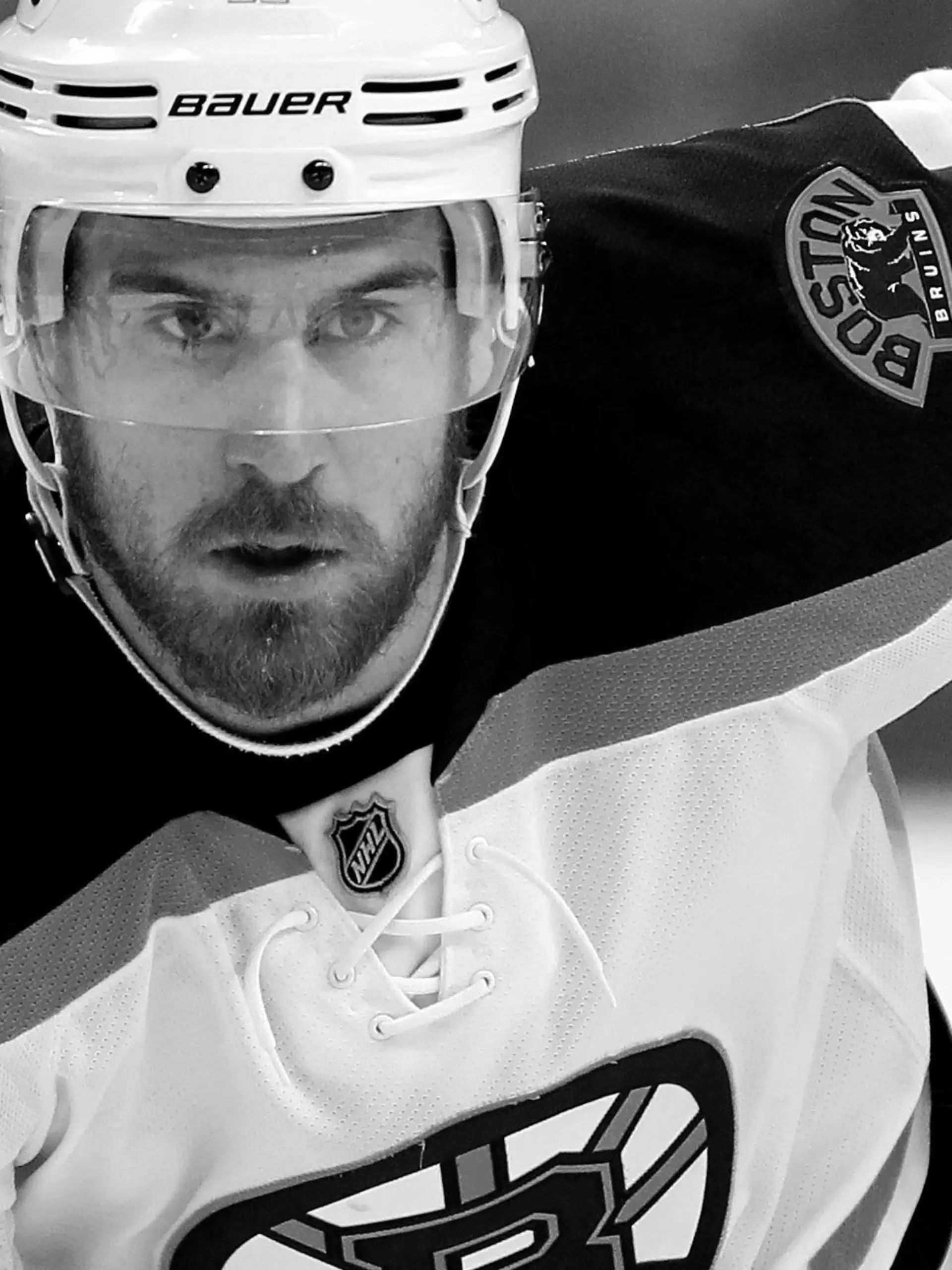 FILE - In this Jan. 13, 2016, file photo, Boston Bruins' Jimmy Hayes looks on during an NHL hockey game against the Philadelphia Flyers in Philadelphia. Kevin Hayes spent a life in step with big brother Jimmy, a couple of kids from Boston's largest neighborhood who attended the same boarding school, same college and, ultimately, played head-to-head in the NHL. In August, Kevin Hayes stood behind to a lectern inside a jammed Catholic parish, steeled his nerves and told mourners about the best brother in the world. (AP Photo/Tom Mihalek, File)