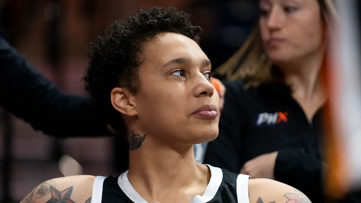 Phoenix Mercury center Brittney Griner watches teammates warm up on the court before a WNBA basketball game against the Washington Mystics, Sunday, July 23, 2023, in Washington. (AP Photo/Stephanie Scarbrough)