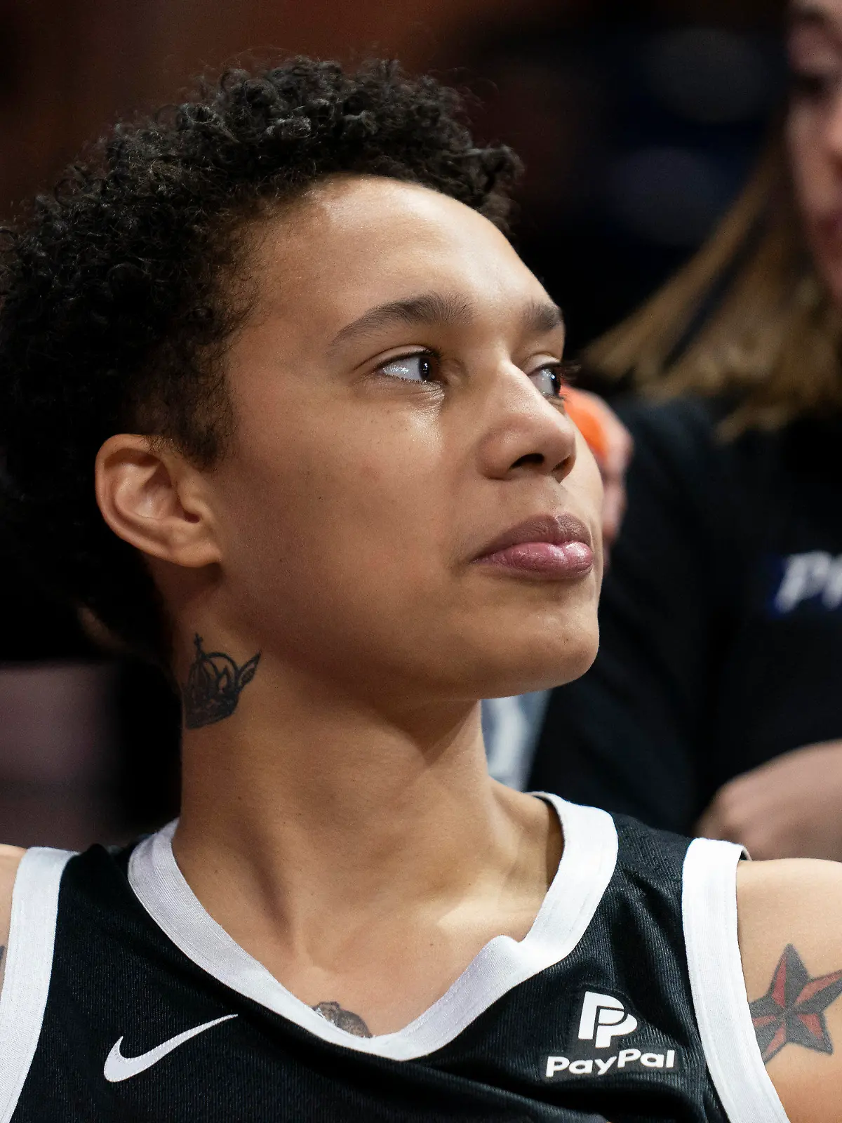 Phoenix Mercury center Brittney Griner watches teammates warm up on the court before a WNBA basketball game against the Washington Mystics, Sunday, July 23, 2023, in Washington. (AP Photo/Stephanie Scarbrough)