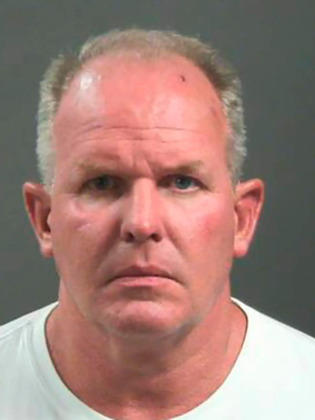 This photo provided by Washington County, Arkansas shows Douglas Ramsey.  Officials say Ramsey, a vegan food products company executive has been charged with felony battery and making a terroristic after a fracas outside a football game in which he's accused of biting a man's nose.  Ramsey, Beyond Meat Chief Operations Officer,  is accused in the road rage attack outside Saturday, Sept. 17, 2022, game in Fayetteville between the Arkansas Razorbacks and Missouri State Bears.   (Washington County, Arkansas Sheriff's Office via AP)