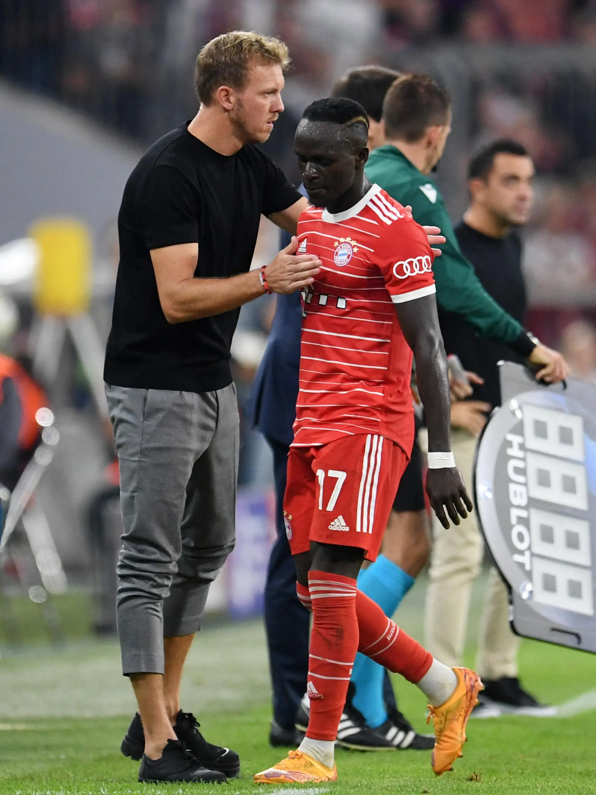 Soccer Football - Champions League - Group C - Bayern Munich v FC Barcelona - Allianz Arena, Munich, Germany - September 13, 2022  Bayern Munich coach Julian Nagelsmann with Sadio Mane after he was substituted REUTERS/Andreas Gebert