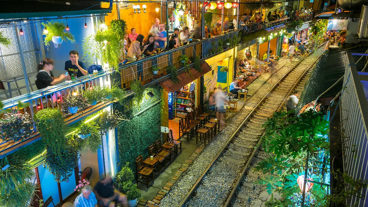 HANOI, VIETNAM - SEP 9, 2019: Famous Train Street at the Phung Hung Street, popular tourist destination in old town Hanoi by night