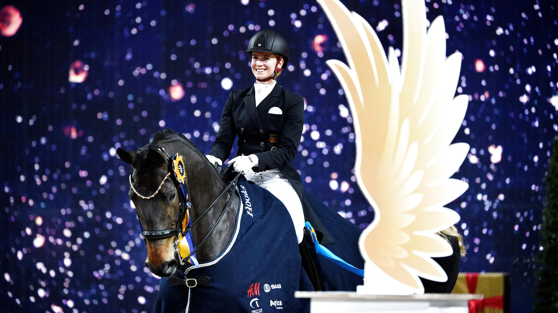 Equestrian - The Sweden International Horse Show - Friends Arena, Stockholm, Sweden - November 27, 2021 Germany's Jessica Von Bredow-Werndl celebrates while riding Tsf Dalera BB after winning the FEI Grand Prix dressage event Jessica Gow/TT News Agency via REUTERS ATTENTION EDITORS - THIS IMAGE WAS PROVIDED BY A THIRD PARTY. SWEDEN OUT. NO COMMERCIAL OR EDITORIAL SALES IN SWEDEN.