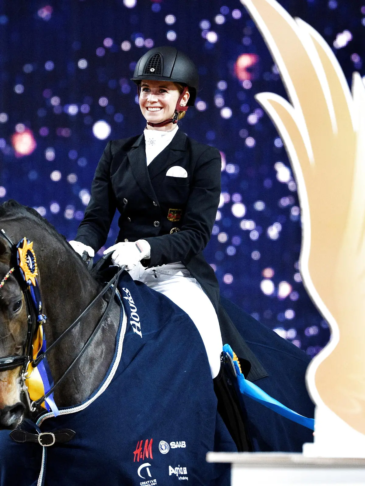 Equestrian - The Sweden International Horse Show - Friends Arena, Stockholm, Sweden - November 27, 2021 Germany's Jessica Von Bredow-Werndl celebrates while riding Tsf Dalera BB after winning the FEI Grand Prix dressage event  Jessica Gow/TT News Agency via REUTERS     ATTENTION EDITORS - THIS IMAGE WAS PROVIDED BY A THIRD PARTY. SWEDEN OUT. NO COMMERCIAL OR EDITORIAL SALES IN SWEDEN.