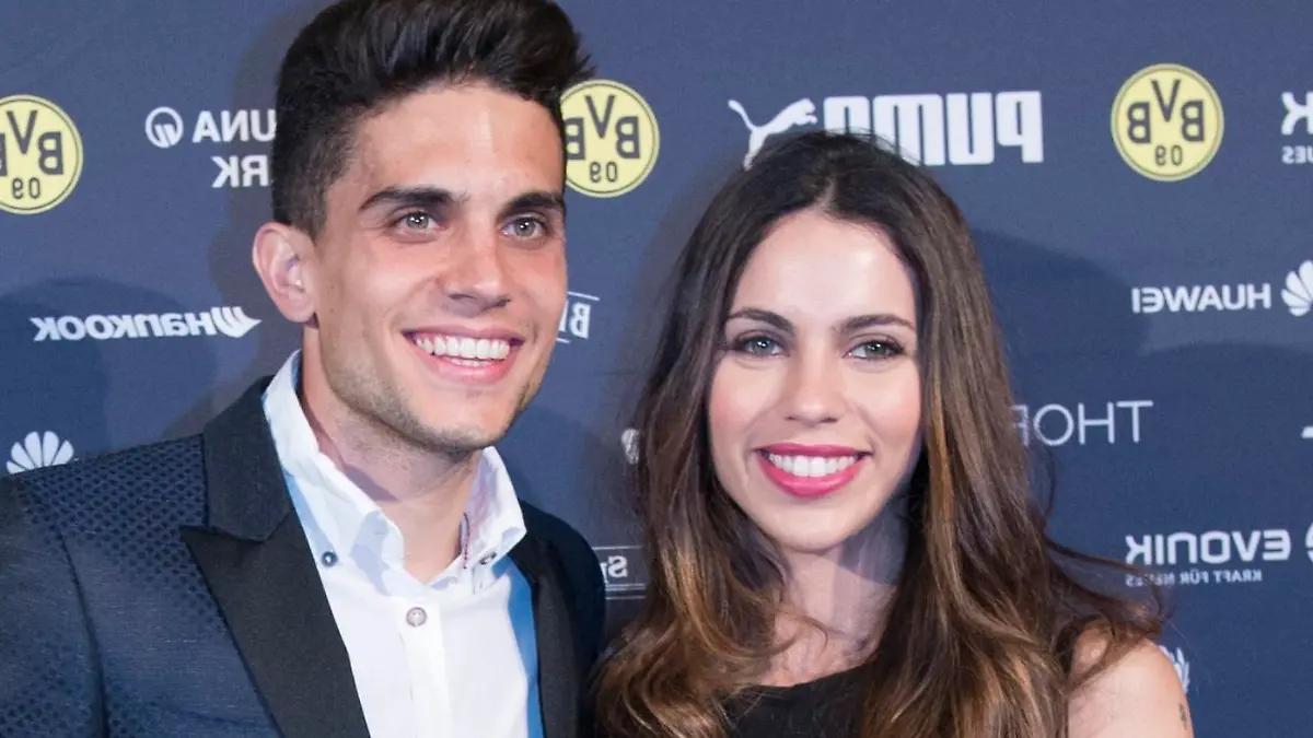 ARCHIV - 28.05.2017, Berlin: Marc Bartra und seine Freundin Melissa Jimenez kommen ins Mannschaftshotel von Borussia Dortmund. Der spanische Fußball-Profi Marc Bartra ist zum zweiten Mal Vater geworden. (zu dpa "Ex-Dortmund-Profi Marc Bartra wieder Vater geworden" vom 26.04.2018) Foto: Paul Zinken/dpa +++ dpa-Bildfunk +++