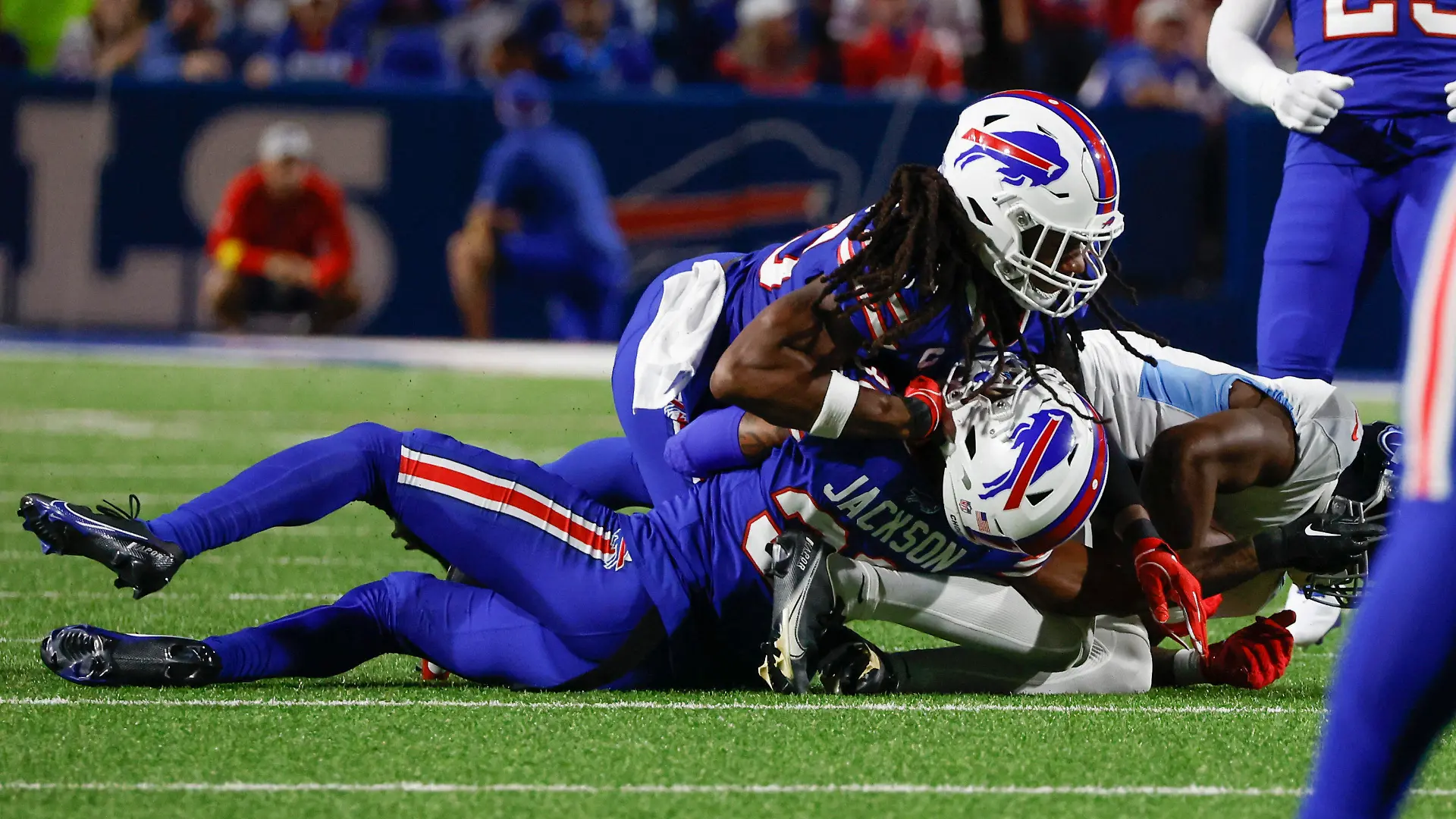 Buffalo Bills cornerback Dane Jackson, bottom, is injured on a play during the first half of an NFL football game against the Tennessee Titans, Monday, Sept. 19, 2022, in Orchard Park, N.Y. (AP Photo/Jeffrey T. Barnes)