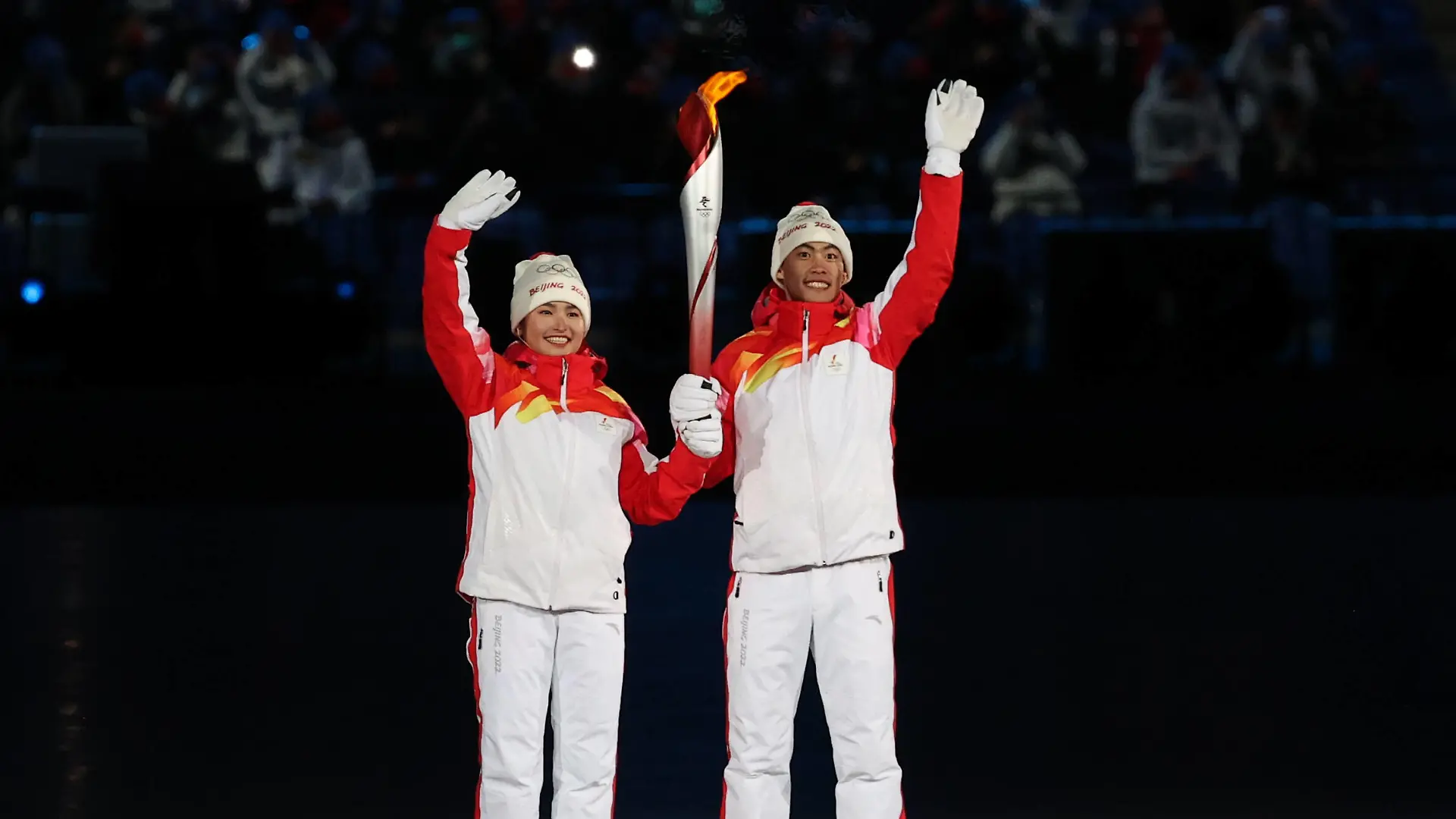 BEIJING, CHINA FEBRUARY 4, 2022: Chinese athletes Dinigeer Yilamujiang and Zhao Jiawen light the snowflake-shaped Olympic cauldron at the opening ceremony of the Beijing 2022 Winter Olympic Games, Olympische Spiele, Olympia, OS at the National Stadium also known as the Bird s Nest. Sergei Bobylev/TASS PUBLICATIONxINxGERxAUTxONLY TS121559