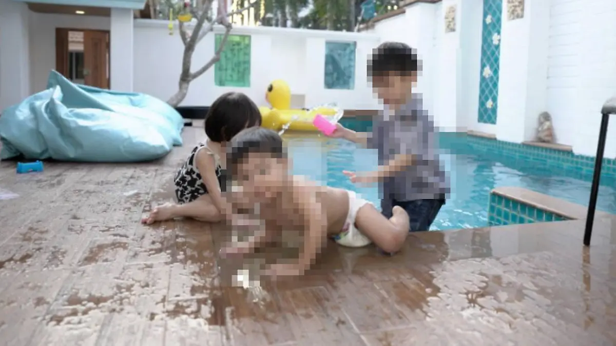 Chawanakon Hancharoenpanna, 2, who drowned later that evening plays next to the villa siwmming pool where his OnlyFans model mother was holding a photoshoot in Pattaya, Thailand, February 14, 2022.
NEWS COPY - WITH VIDEO AND PICTURES
A two-year-old boy drowned in a villa’s swimming pool while his OnlyFans model mother partied with friends for a photoshoot in the house inside.
The youngster Chawanakon Hancharoenpanna was taken with his mother Wiyada Pontawee, 26, and her photographer husband to the house in Pattaya, Thailand, on Valentine’s Day.
Several other adult models are also understood to have attended the party, which also doubled as a photoshoot.
Wiyada, whose nickname is ‘Soda’, posed in front of the pool in a revealing black bikini earlier in the day. The lad, along with his younger brother and another child, were also pictured splashing around in the pool.
Tragically, Chawanakon – who was just two days away from his third birthday – drowned in the pool later that evening while his mother was 'working' inside having her pictures and video taken. She regularly poses in explicit images for OnlyFans and other adult platforms.
The emergency services were called at 10pm and raced to the scene in an ambulance. Medics performed CPR on the youngster and he was taken to hospital before being pronounced dead later that evening.
NEWS COPY - WITH VIDEO AND PICTURES
A two-year-old boy drowned in a villa’s swimming pool while his OnlyFans model mother partied with friends for a photoshoot in the house inside.
The youngster Chawanakon Hancharoenpanna was taken with his mother Wiyada Pontawee, 26, and her photographer husband to the house in Pattaya, Thailand, on Valentine’s Day.
Several other adult models are also understood to have attended the party, which also doubled as a photoshoot.
Wiyada, whose nickname is ‘Soda’, posed in front of the pool in a revealing black bikini earlier in the day. The lad, along with his younger b