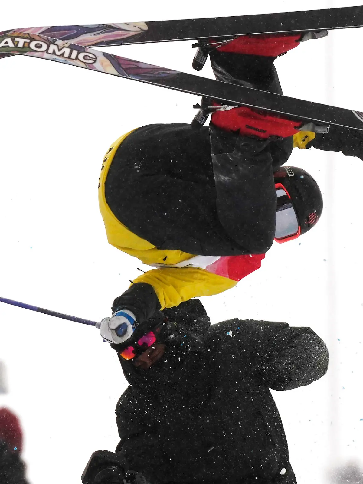 Finland's Jon Sallinen collides with a cameraman during the men's halfpipe qualification at the 2022 Winter Olympics, Thursday, Feb. 17, 2022, in Zhangjiakou, China. (AP Photo/Francisco Seco)