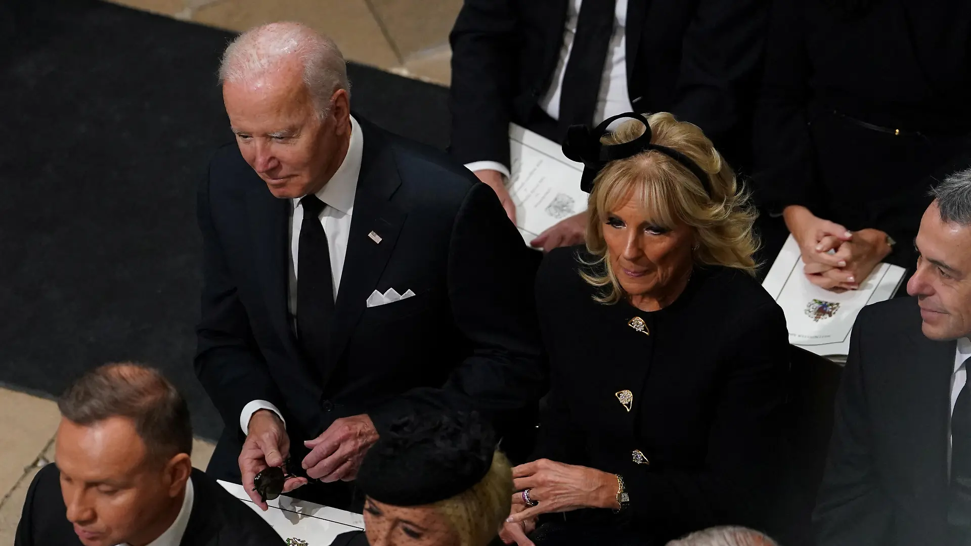 US President Joe Biden accompanied by the First Lady Jill Biden arriving for the State Funeral of Queen Elizabeth II, held at Westminster Abbey, London. Picture date: Monday September 19, 2022. Gareth Fuller/Pool via REUTERS