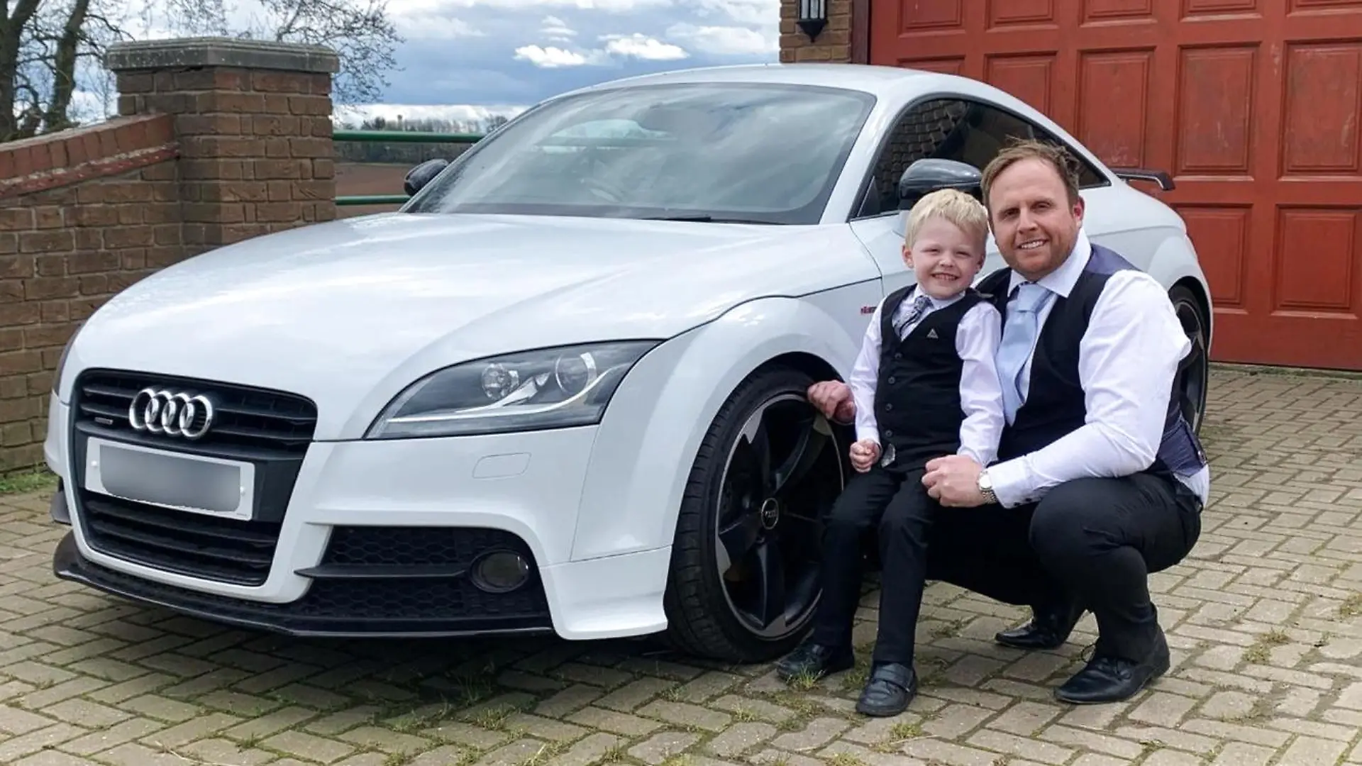 PIC FROM Kennedy News and Media (PICTURED: MATT WARD (37) AND HIS SON ALFIE WARD (5) FROM WORKSOP, NOTTINGHAMSHIRE) This five-year-old lad has been working alongside his dad at their car dealership since the age of ONE - earning £1 for every scratch or dent he spots. Matt Ward said that he's been bringing his son Alfie Ward to work at his used car dealership Voldi Ltd every Saturday 'come rain, sleet, sun, snow or shine' for the past three and a half years. But when the 37-year-old was quizzed by one customer why Alfie was not 'inside watching TV', Matt was comepelled to outlined the benefits for his son including increasing his self-esteem, enabling him to learn the value of money and creating 'fun memories' with his dad. DISCLAIMER: While Kennedy News and Media uses its best endeavours to establish the copyright and authenticity of all pictures supplied, it accepts no liability for any damage, loss or legal action caused by the use of images supplied and the publication of images is solely at your discretion. SEE KENNEDY NEWS COPY - 0161 697 4266