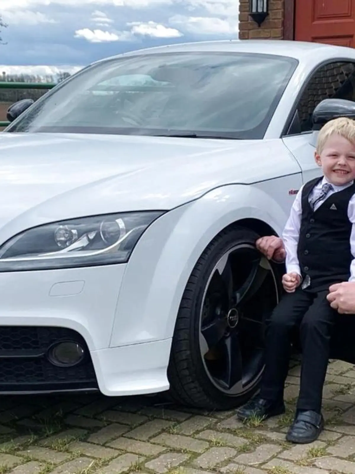 PIC FROM Kennedy News and Media (PICTURED: MATT WARD (37) AND HIS SON ALFIE WARD (5) FROM WORKSOP, NOTTINGHAMSHIRE) This five-year-old lad has been working alongside his dad at their car dealership since the age of ONE - earning £1 for every scratch or dent he spots. Matt Ward said that he's been bringing his son Alfie Ward to work at his used car dealership Voldi Ltd every Saturday 'come rain, sleet, sun, snow or shine' for the past three and a half years. But when the 37-year-old was quizzed by one customer why Alfie was not 'inside watching TV', Matt was comepelled to outlined the benefits for his son including increasing his self-esteem, enabling him to learn the value of money and creating 'fun memories' with his dad. DISCLAIMER: While Kennedy News and Media uses its best endeavours to establish the copyright and authenticity of all pictures supplied, it accepts no liability for any damage, loss or legal action caused by the use of images supplied and the publication of images is solely at your discretion. SEE KENNEDY NEWS COPY - 0161 697 4266