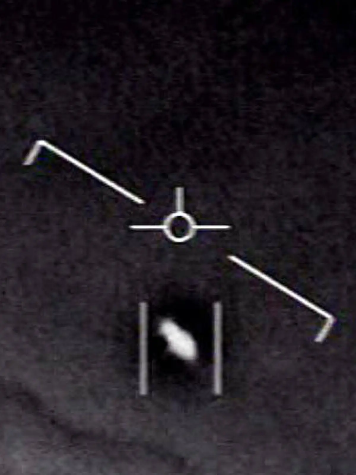 HANDOUT - 10.06.2021, ---: Das Standbild eines vom US-Verteidigungsministerium veröffentlichten Videos zeigt ein Unidentifiziertes Flugobjekt, das von Piloten der US-Marine gesichtet wurde. (Bestmögliche Bildqualität. Aufnahmedatum unbekannt). Der US-Kongress wird sich am Dienstag mit unidentifizierten Flugobjekten (Ufos) beschäftigen. (zu dpa «Erste Anhörung zu Ufos seit Jahrzehnten im US-Kongress») Foto: U.S. Department of Defense/dpa - ACHTUNG: Nur zur redaktionellen Verwendung im Zusammenhang mit der aktuellen Berichterstattung und nur mit vollständiger Nennung des vorstehenden Credits +++ dpa-Bildfunk +++