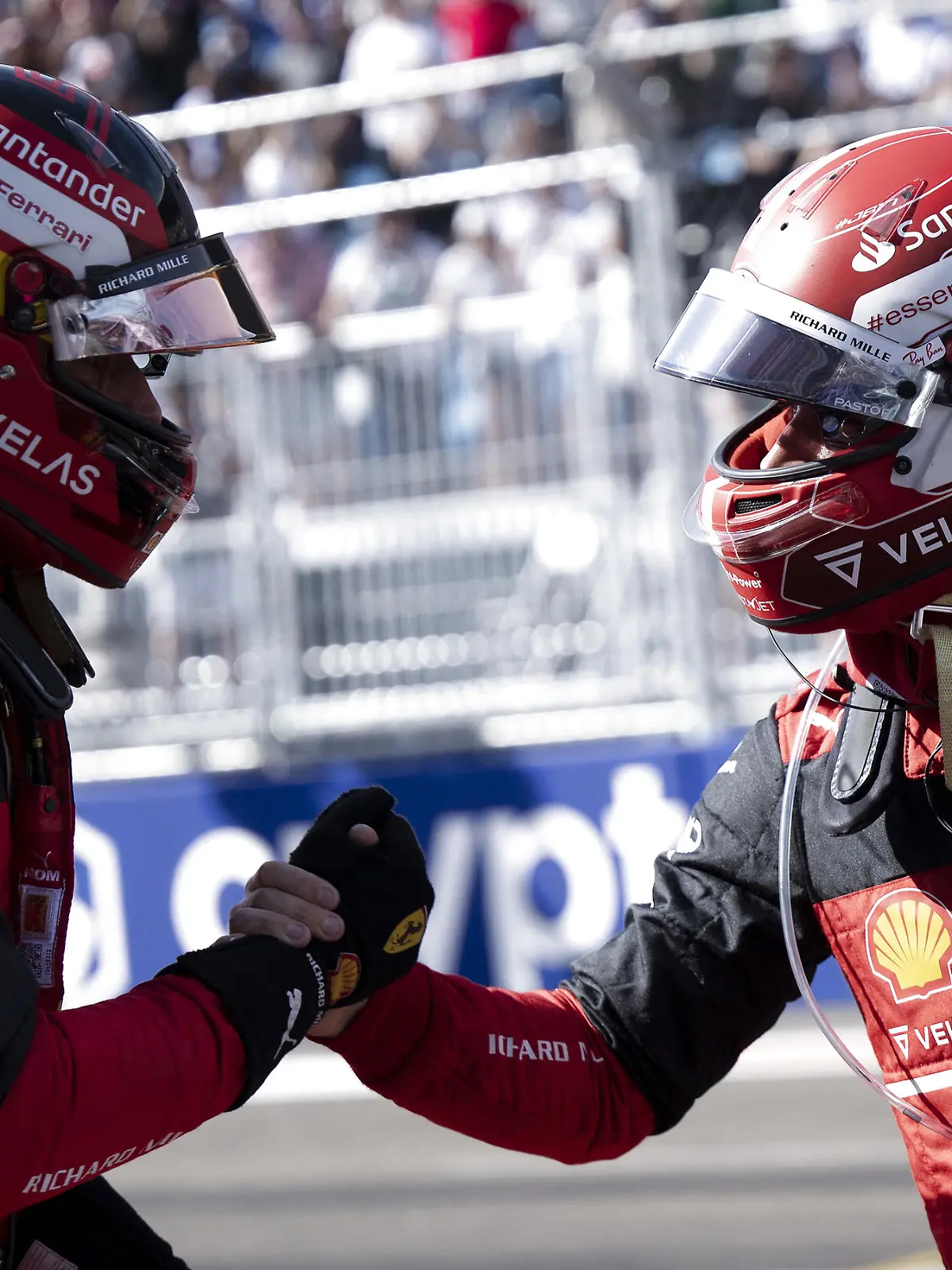 Formula One F1 - Miami Grand Prix - Miami International Autodrome, Miami, Florida, U.S. - May 7, 2022  Ferrari's Charles Leclerc celebrates after qualifying in pole position with second place Ferrari's Carlos Sainz Jr. Pool via REUTERS/Brendan Smialowski