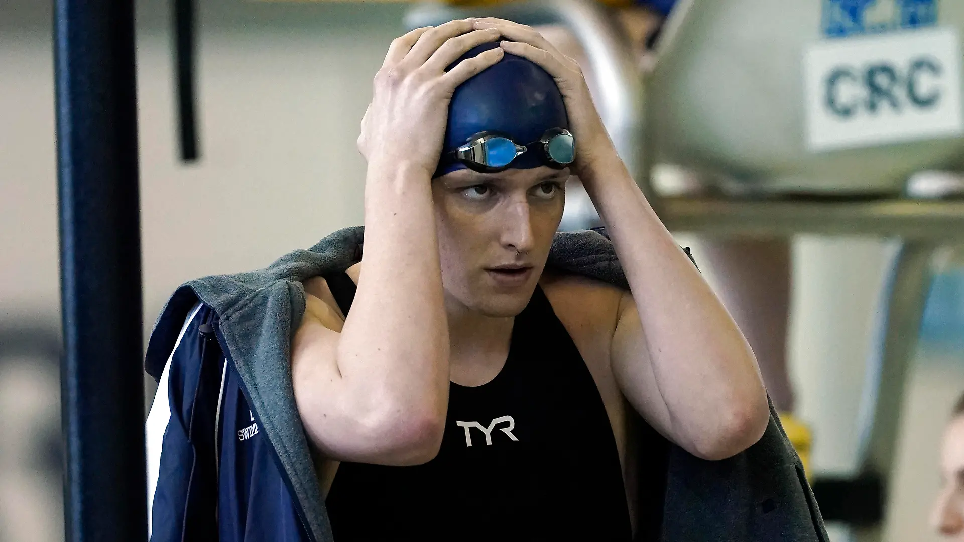 FILE - Pennsylvania transgender swimmer Lia Thomas waits for a preliminary heat in the Women's NCAA 500-yard freestyle swimming championship, March 17, 2022, at Georgia Tech in Atlanta.  (AP Photo/John Bazemore, File)