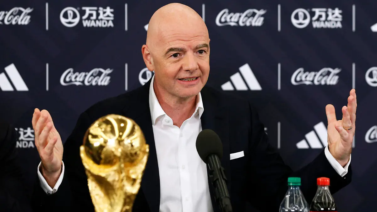 FIFA President Gianni Infantino answers questions during a 2026 soccer World Cup news conference Thursday, June 16, 2022, in New York. (AP Photo/Noah K. Murray)