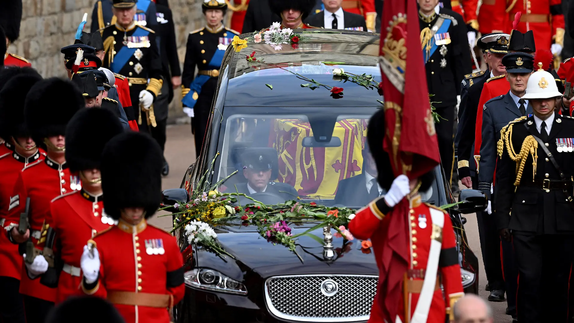 The Royal State Hearse carrying the coffin of Queen Elizabeth II arrives at Windsor Castle for the Committal Service for Queen Elizabeth II, in Windsor, England, Monday, Sept. 19, 2022. (Leon Neal/Pool photo via AP)