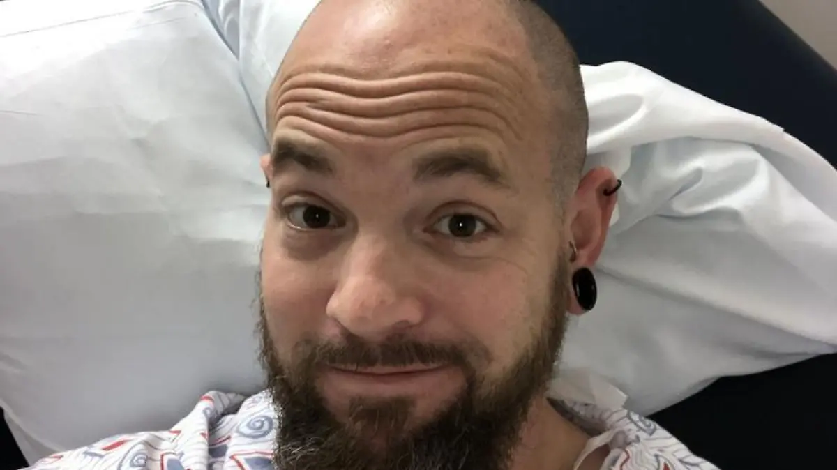 PIC FROM Kennedy News and Media (PICTURED: JOEY LYKINS, 35, FROM CINCINATTI, OHIO, WHO DISCOVERED THAT THE NOSE RING HE LOST FIVE YEARS AGO WAS LODGED IN HIS LEFT LUNG IN HOSPITAL THE DAY HE HAD IT REMOVED) A piercings fanatic who woke up to find his nose ring had vanished in the night was horrified to discover it had been lodged in his LUNG for the last five years. Joey Lykins rushed to hospital at 2.30am last Tuesday [Aug 30th] through fear he had pneumonia after coughing so violently he ended up with back ache. Doctors carried out an x-ray and were stunned to spot the piece of jewellery that the 35-year-old thought had fallen out of his nose while he was sleeping in the upper lobe of his left lung.DISCLAIMER: While Kennedy News and Media uses its best endeavours to establish the copyright and authenticity of all pictures supplied, it accepts no liability for any damage, loss or legal action caused by the use of images supplied and the publication of images is solely at your discretion. SEE KENNEDY NEWS COPY - 0161 697 4266