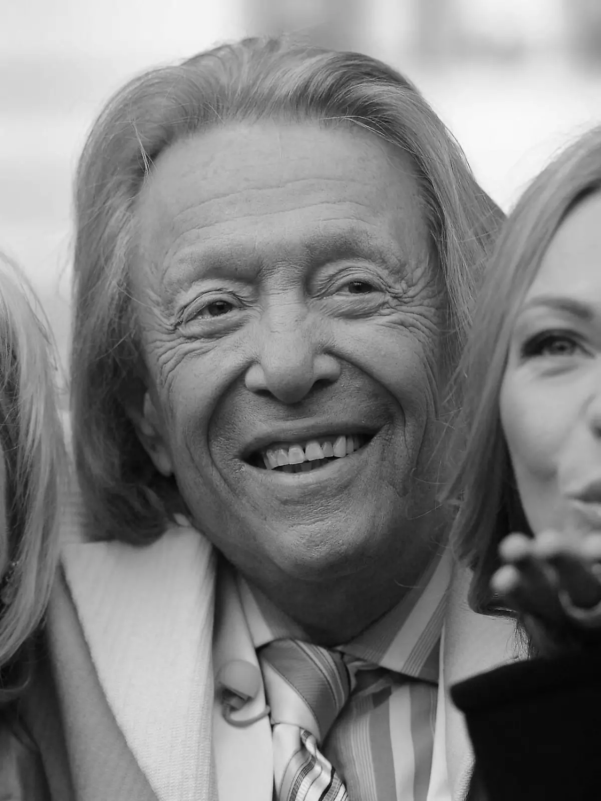 Playboy Rolf Eden, partner Brigitte (R) and daughter Irit Dolev arrive for the premiere of film 'The Big Eden' during the 61st Berlin International Film Festival in Berlin, Germany, 15 February 2011. The film runs in the section Panorama Dokumente of the International Film Festival. The 61st Berlinale takes place from 10 to 20 February 2011. Photo: Hannibal dpa/lbn  +++(c) dpa - Bildfunk+++