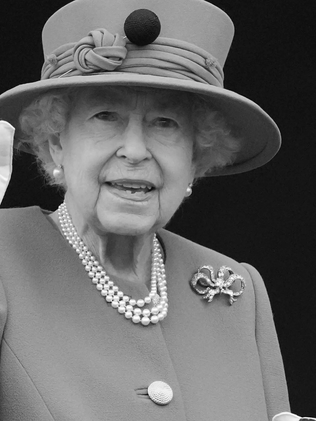 FILE - Queen Elizabeth II waves to the crowd during the Platinum Jubilee Pageant at the Buckingham Palace in London, Sunday, June 5, 2022, on the last of four days of celebrations to mark the Platinum Jubilee. Queen Elizabeth II, Britain’s longest-reigning monarch and a rock of stability across much of a turbulent century, has died. She was 96. Buckingham Palace made the announcement in a statement on Thursday Sept. 8, 2022. (AP Photo/Frank Augstein, File)