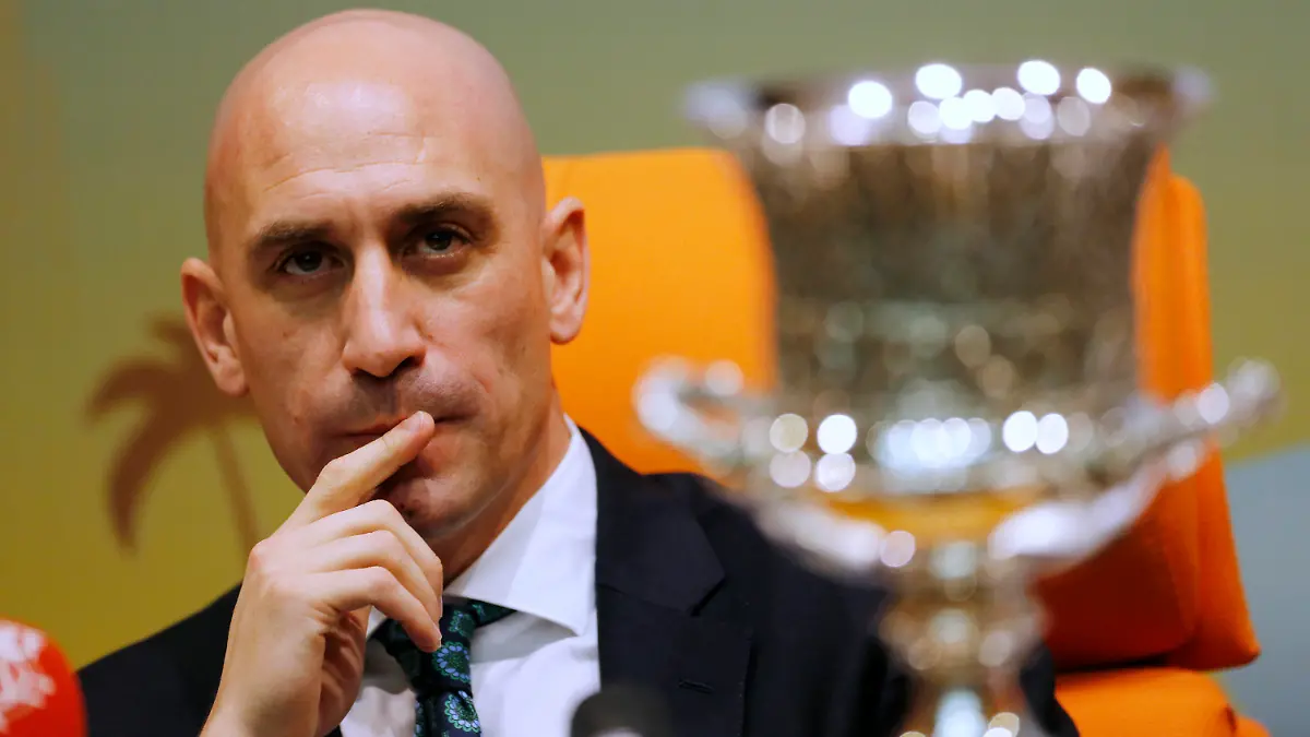 FILE - President of the Spanish Soccer Federation, Luis Rubiales, listens to a reporter as he sets near the Spanish Super Cup, during a press conference with Saudi General Sport Authority chairman Prince Abdulaziz bin Turki Al-Faisal in Jiddah Saudi Arabia, Wednesday, Dec. 18, 2019. The Spanish soccer federation, run by Luis Rubiales, has issued a statement Thursday, Sept. 15, 2022, “firmly denying” accusations by a former employee that federation funds went to pay for a party with “young ladies” in attendance and to hire a detective to investigate the head of Spain's players' union. (AP Photo/Amr Nabil, File)