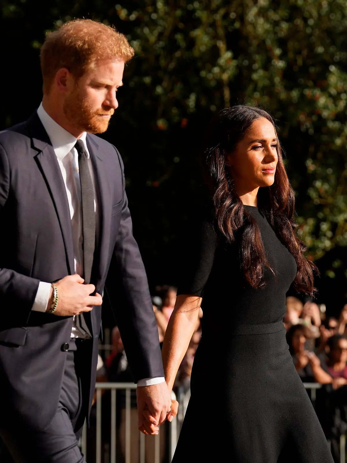 Meghan, Duchess of Sussex and Prince Harry meet members of the public at Windsor Castle, following the death of Queen Elizabeth II on Thursday, in Windsor, England, Saturday, Sept. 10, 2022. (Kirsty O'Connor/Pool Photo via AP)